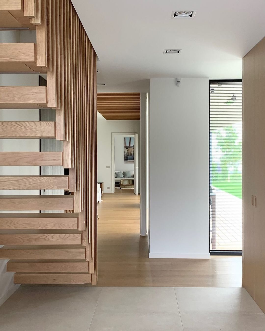 Private residence, Staircase, doors and fitted joinery — interior detail