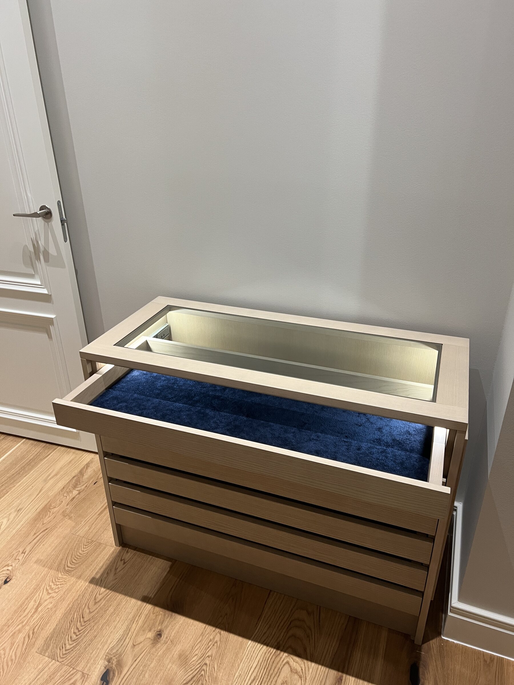 Glass-topped dressing cabinet with lined internal drawer